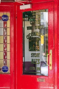 The red front door of Teddy O'Connors Pub in Killarney
